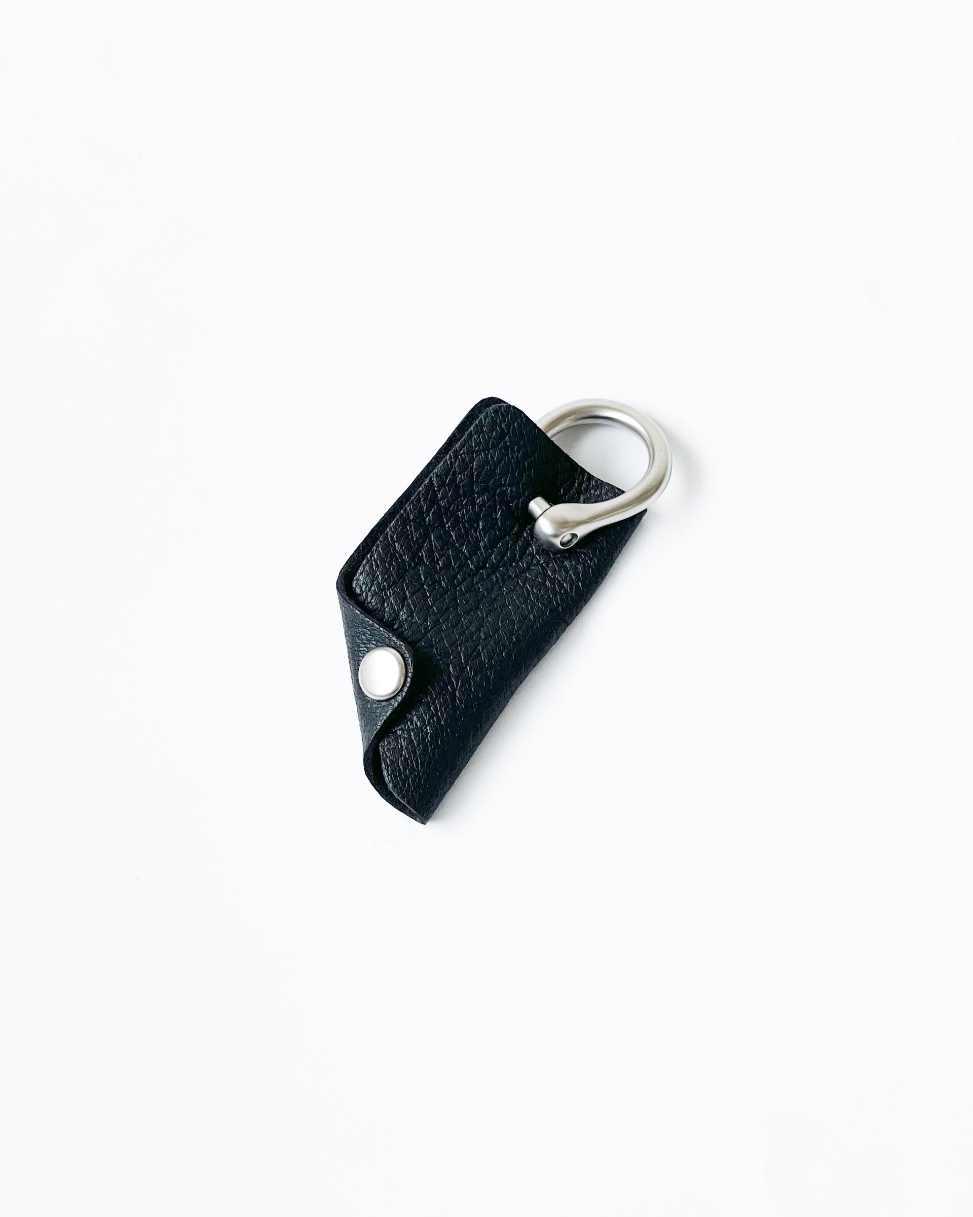 [ERA.]EO GOAT SHACKLE KEY COVER - BLACK