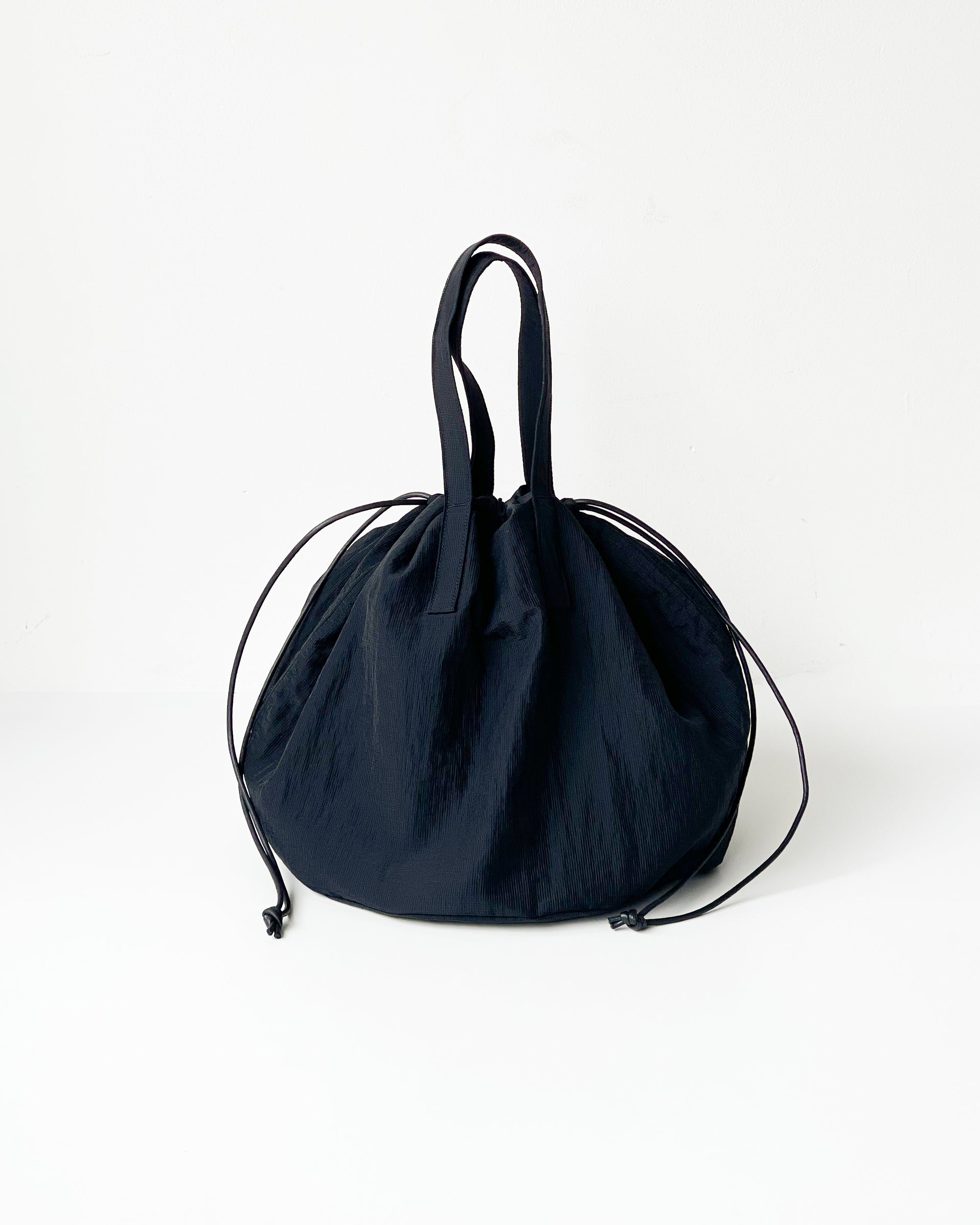 【ERA.】SHEER RIPSTOP HELMET BAG - BLACK
